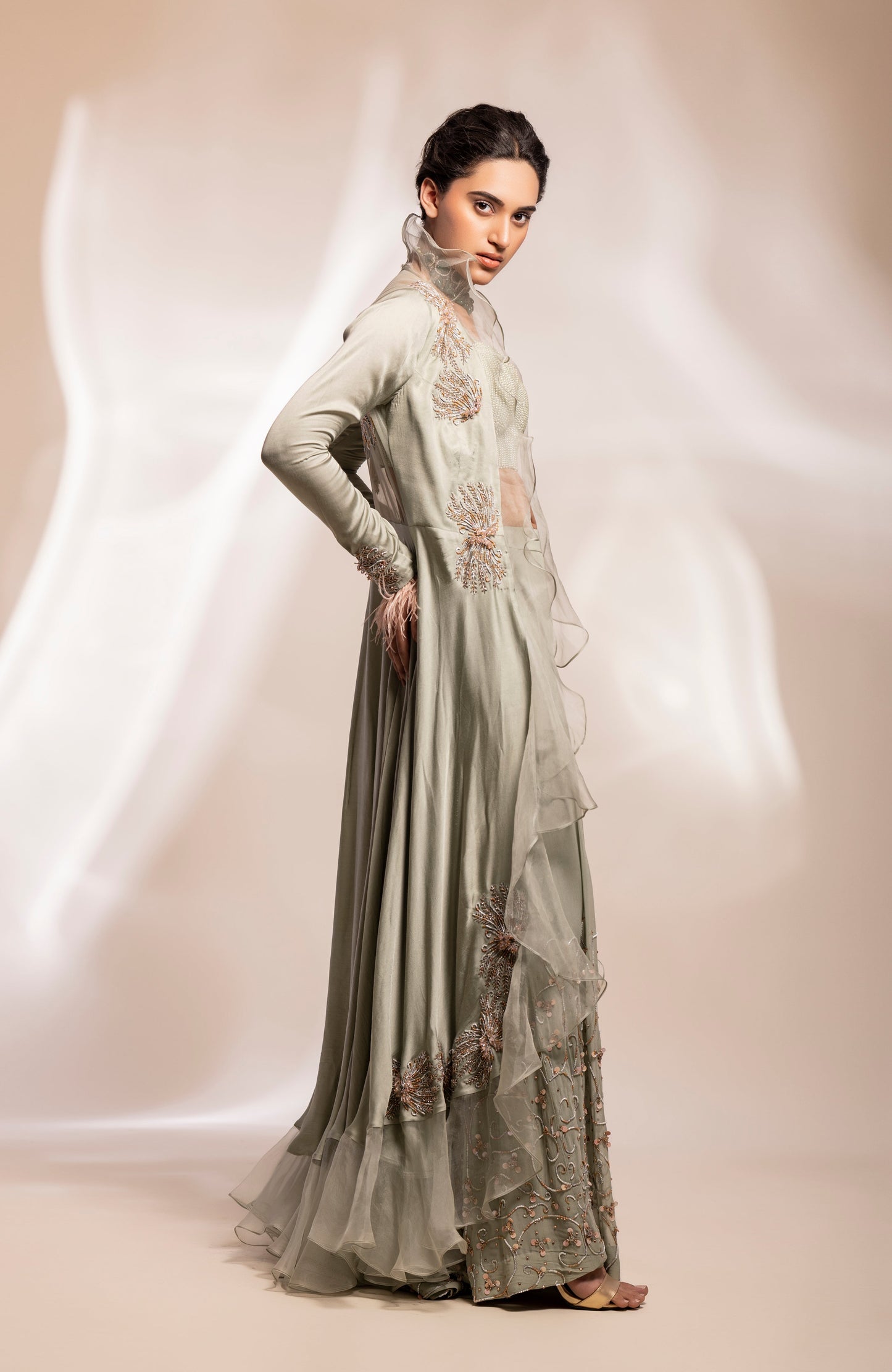 Long assymetrical jacket, inner corset and sharara