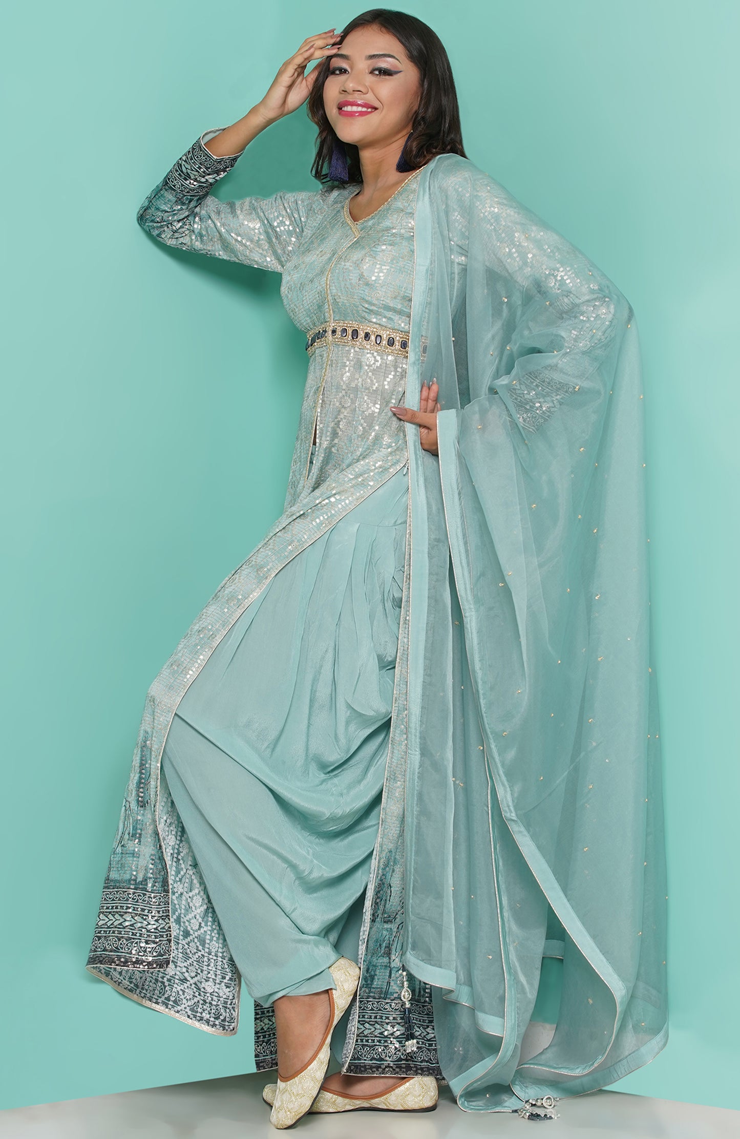 Aqua dress worn with dhoti-cowl trousers