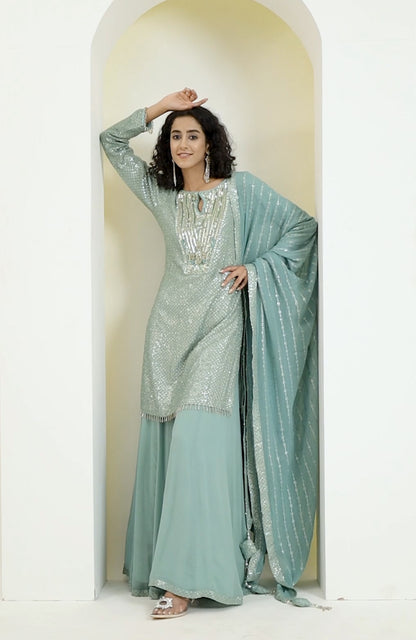 Aqua blue sequinned shirt , embellished with embroidery, dupatta and sharra