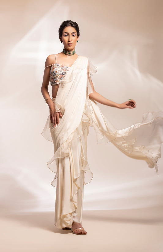 Drape stitched saree with blouse.